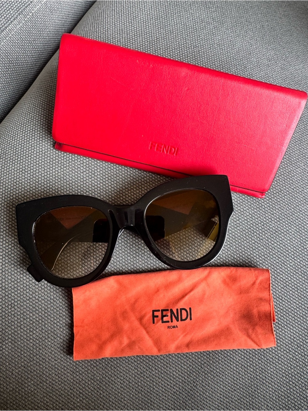 Fendi Black Cat-Eye Sunglasses with Red Case and Orange Pouch